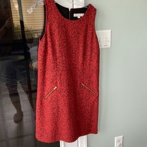Ann Taylor loft size 8 reddish orange and black jumper with a zipper in the back